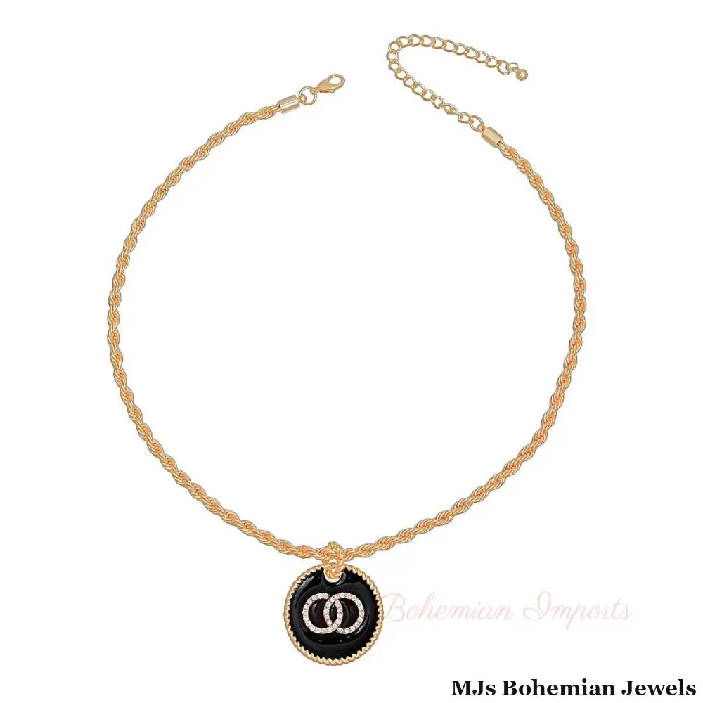 Black Infinity Pendant Gold Twisted Chain