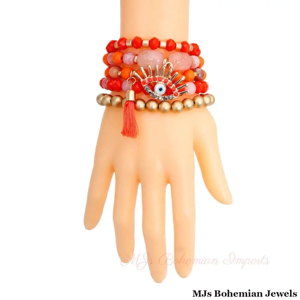 Coral and Matte Gold Evil Eye Bracelets