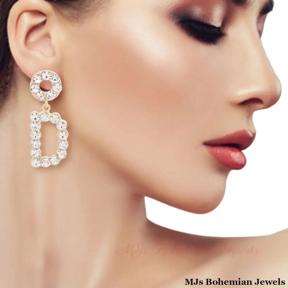 Gold Dangling D Earrings