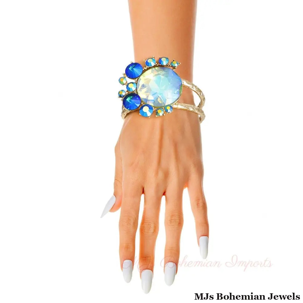 Gold Round Blue Crystals Hinge Cuff